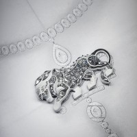 Work on the pieces from the L'ESPRIT DU LION High Jewelry collection in the CHANEL workshop, 18 Place Vendôme, Paris - View of the body of the lion with all of the shaped diamonds.