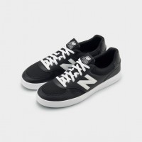 COMME des GARÇONS HOMME × New Balance CT300