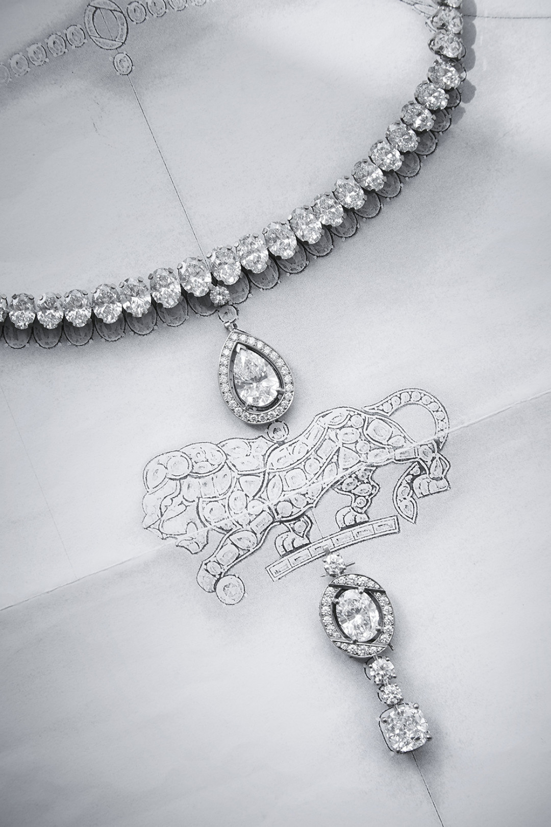 Work on the pieces from the L'ESPRIT DU LION High Jewelry collection in the CHANEL workshop, 18 Place Vendôme, Paris - Work on the oval-cut diamonds for the bezels on the necklace.