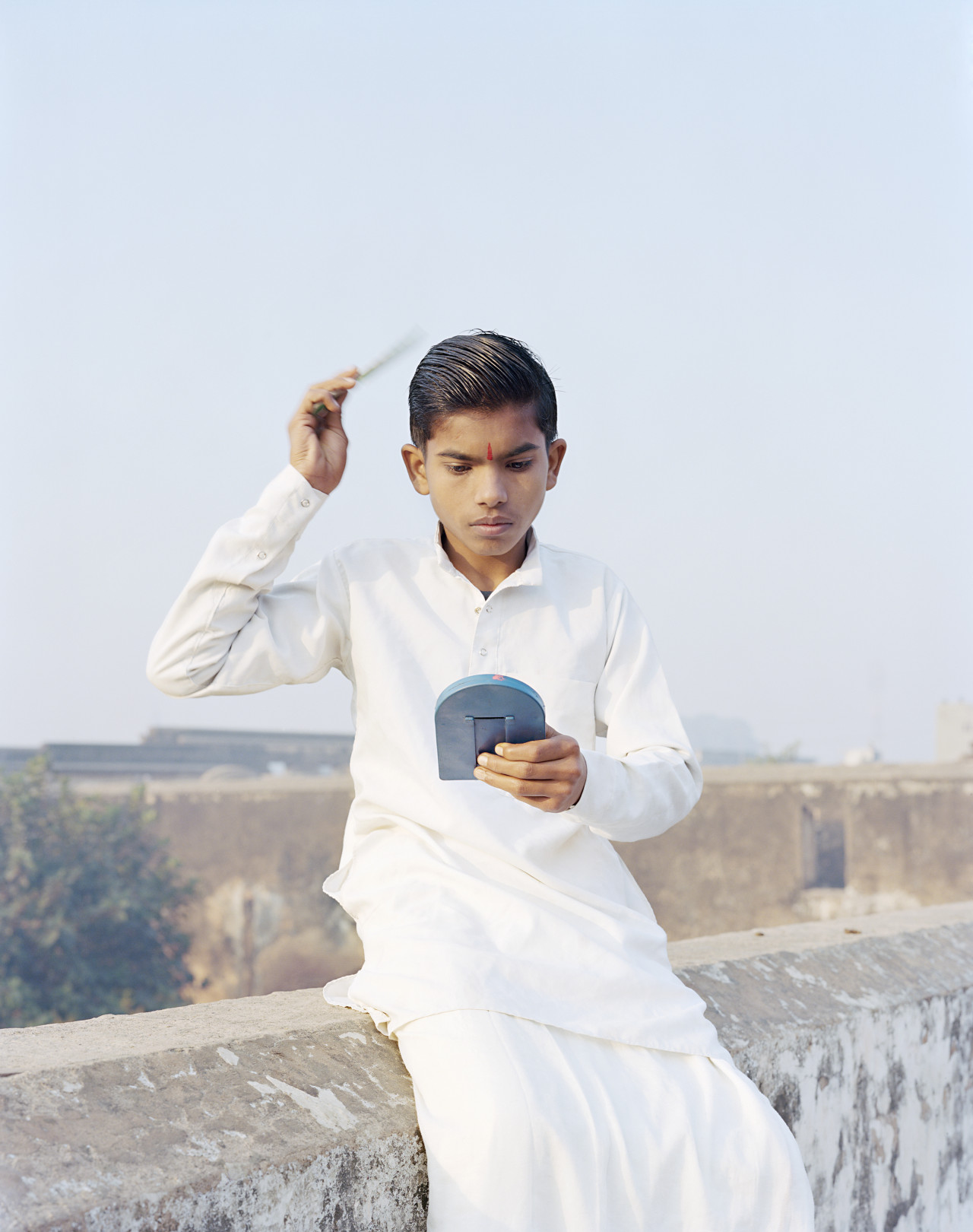 Rama Combing His Hair Ayodhya, India, 2015 ©Vasantha Yogananthan