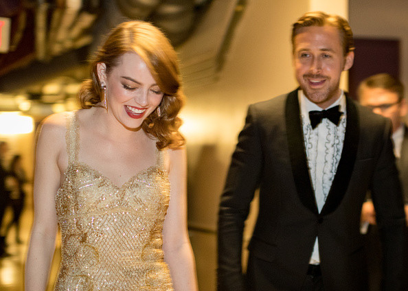 HOLLYWOOD, CA - FEBRUARY 26: Actor Ryan Gosling (R) and actress Emma Stone, winner of Best Actress for 'La La Land' backstage during the 89th Annual Academy Awards at Hollywood & Highland Center on February 26, 2017 in Hollywood, California.